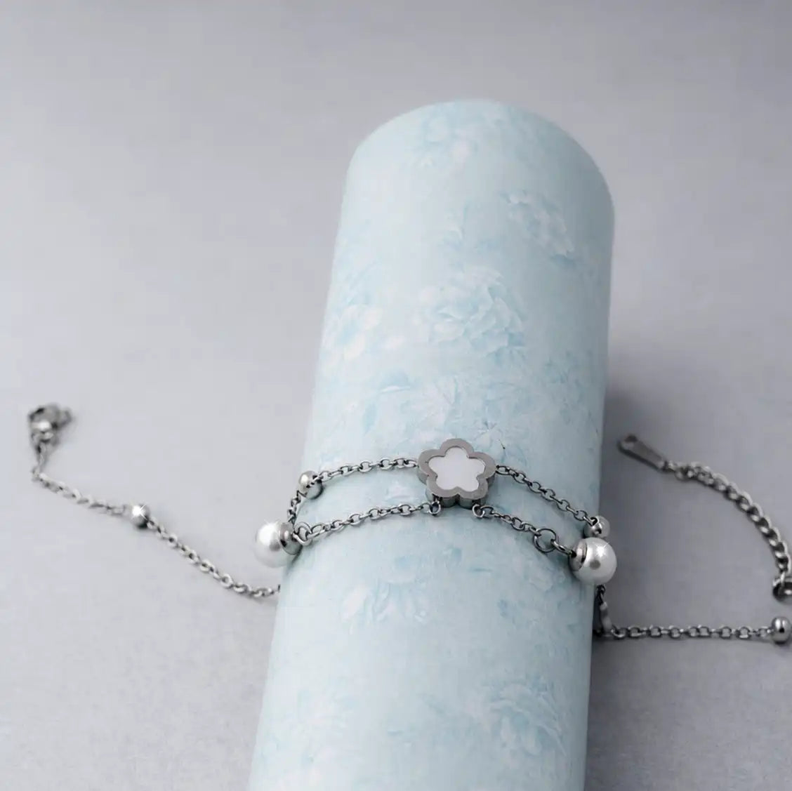 Stainless steel floral charm anklet